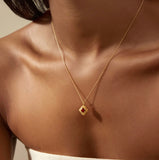 Satya | Spiritual Strength Garnet Lotus Necklace