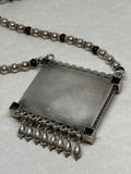 John Blair | "Hat Dance" silver necklace with black onyx